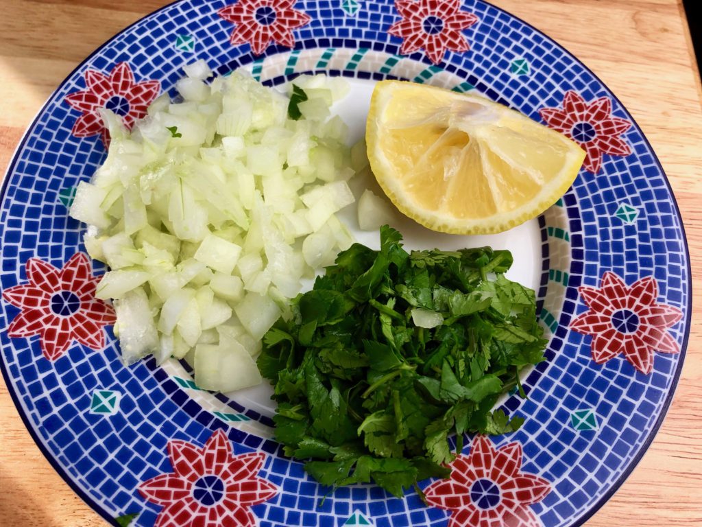 chop onions and cilantro, lemon slice