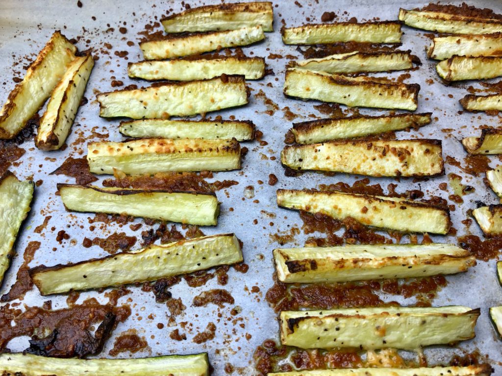 roasted zucchini fries on parchment