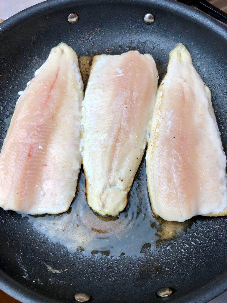 cook trout side side down, until most of pink in fish is gone