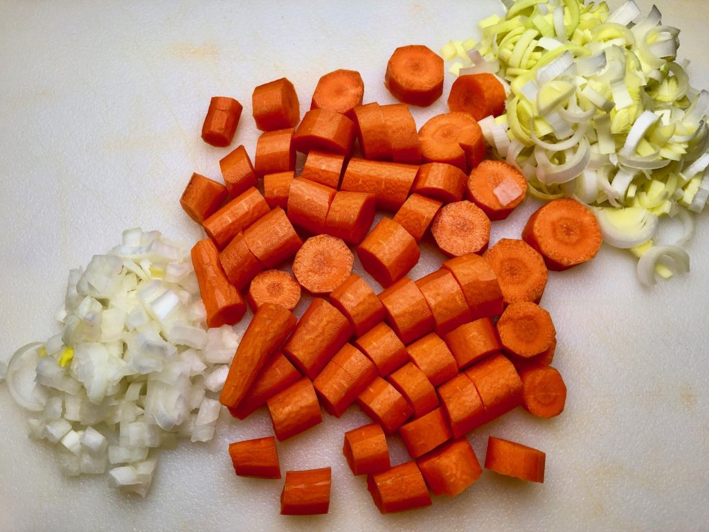 chopped carrots and onions, sliced leeks