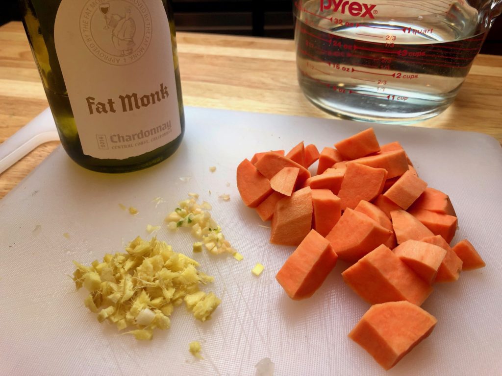 chop sweet potato, ginger and garlic. organize wine and water 