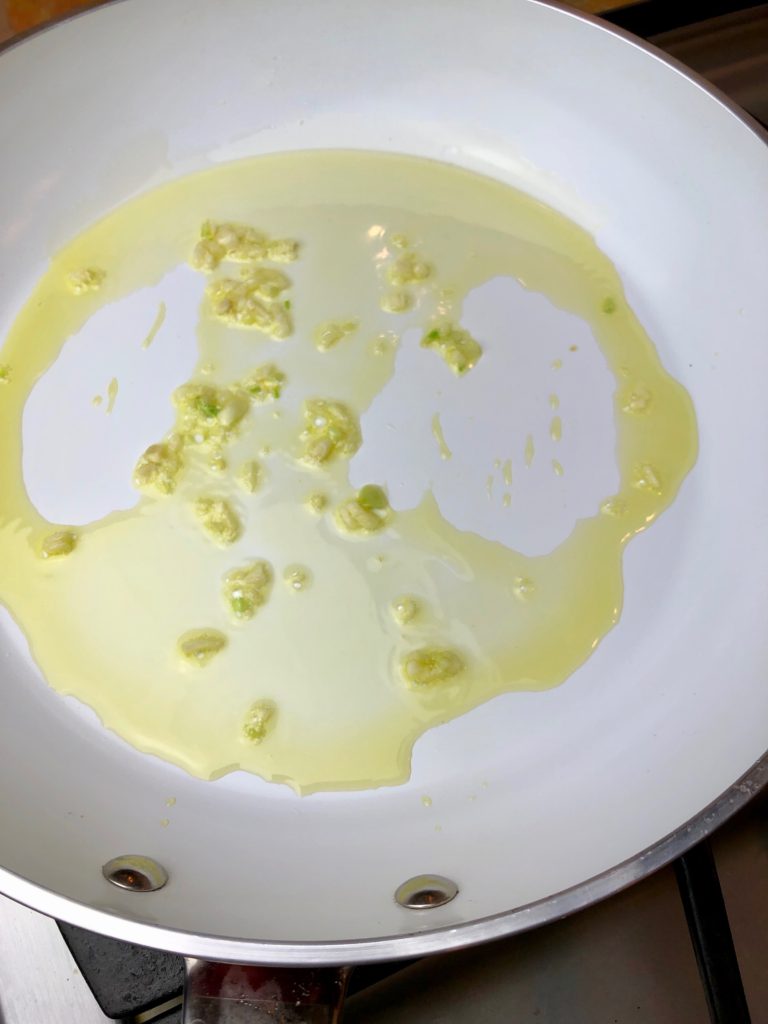 heated olive oil with garlic