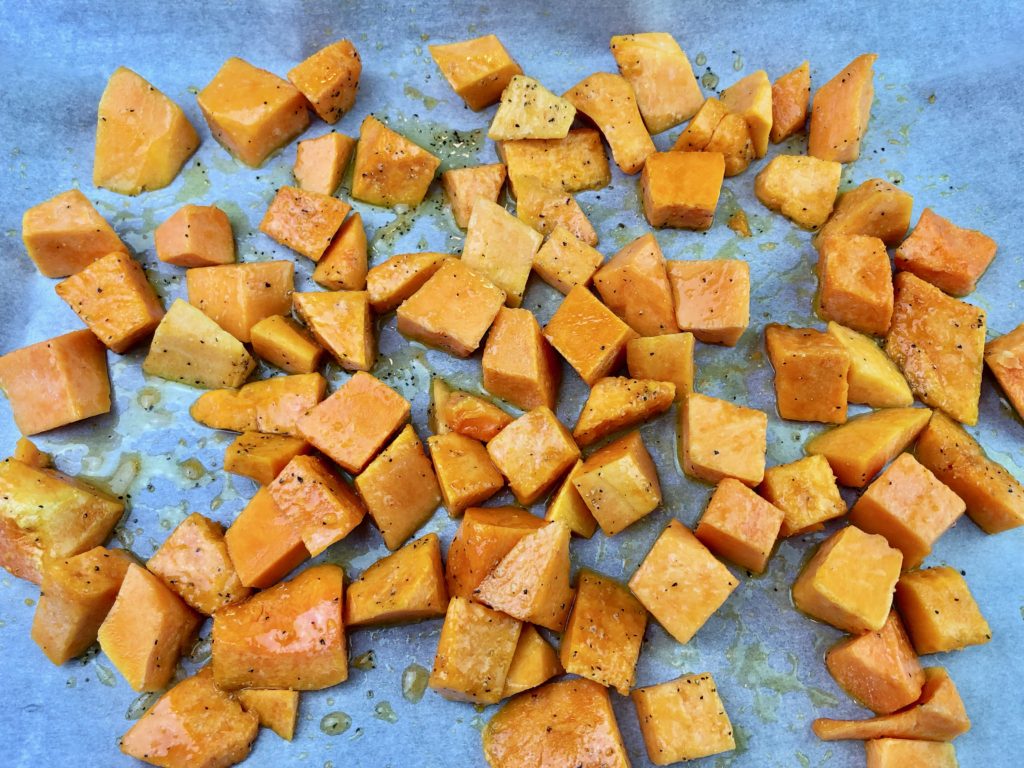 olive oil, maple syrup, salt and pepper tossed with butternut squash