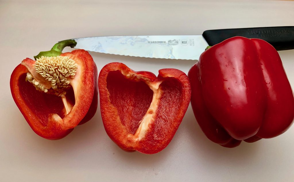 red peppers, cut in half