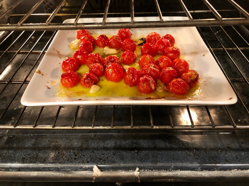 cherry tomatoes roasting in oven