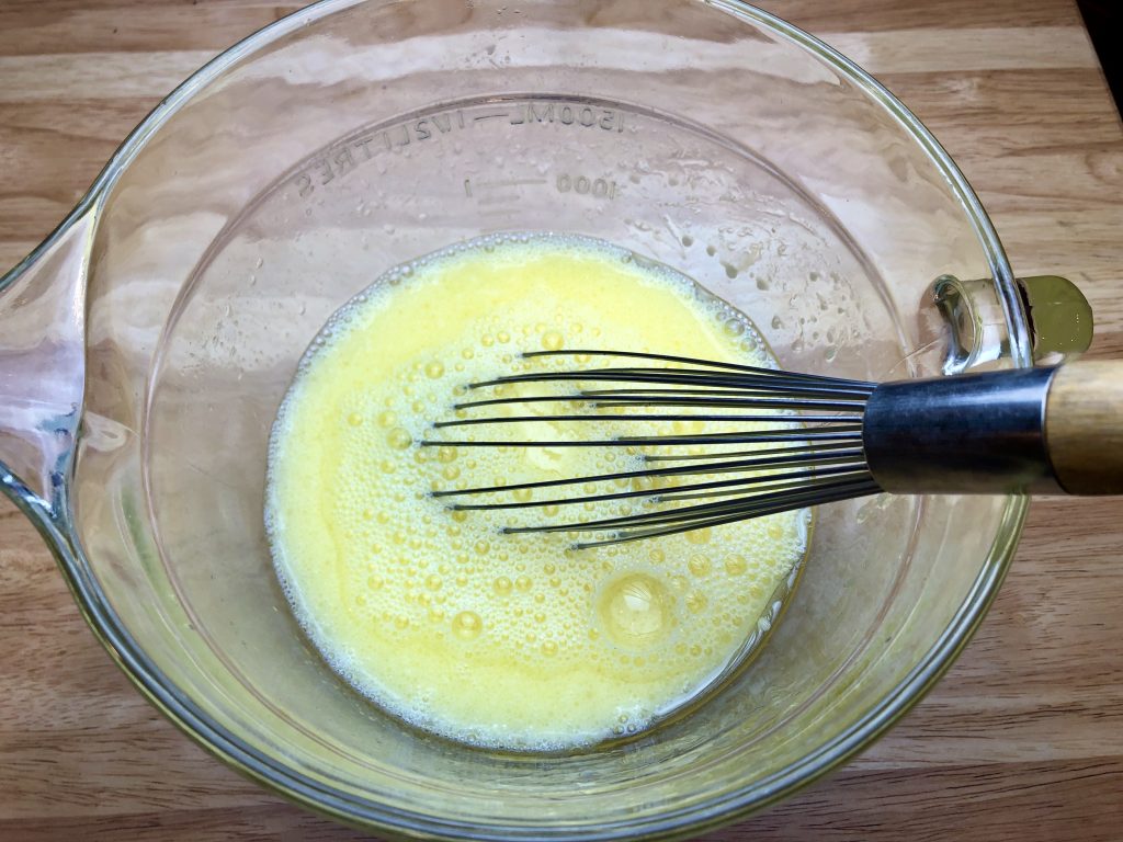 Mix eggs, water and oil together
