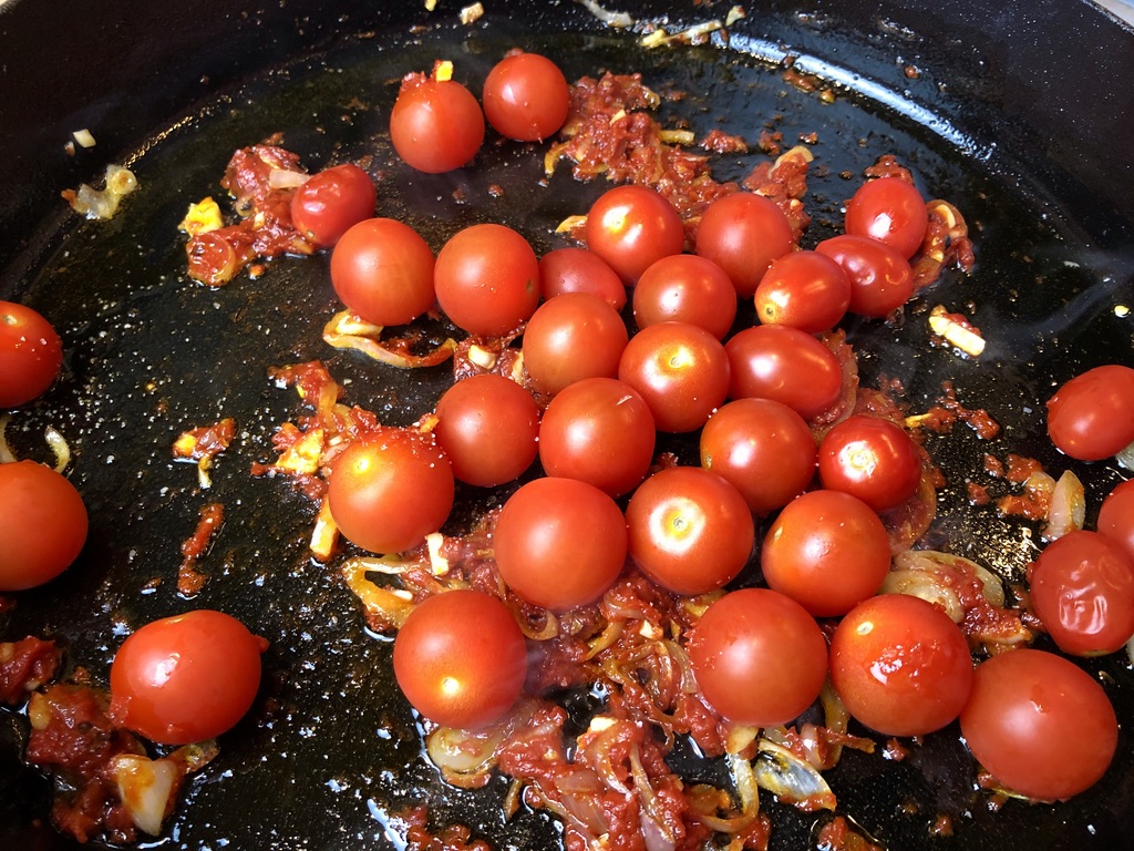 add cherry tomatoes to tomato paste