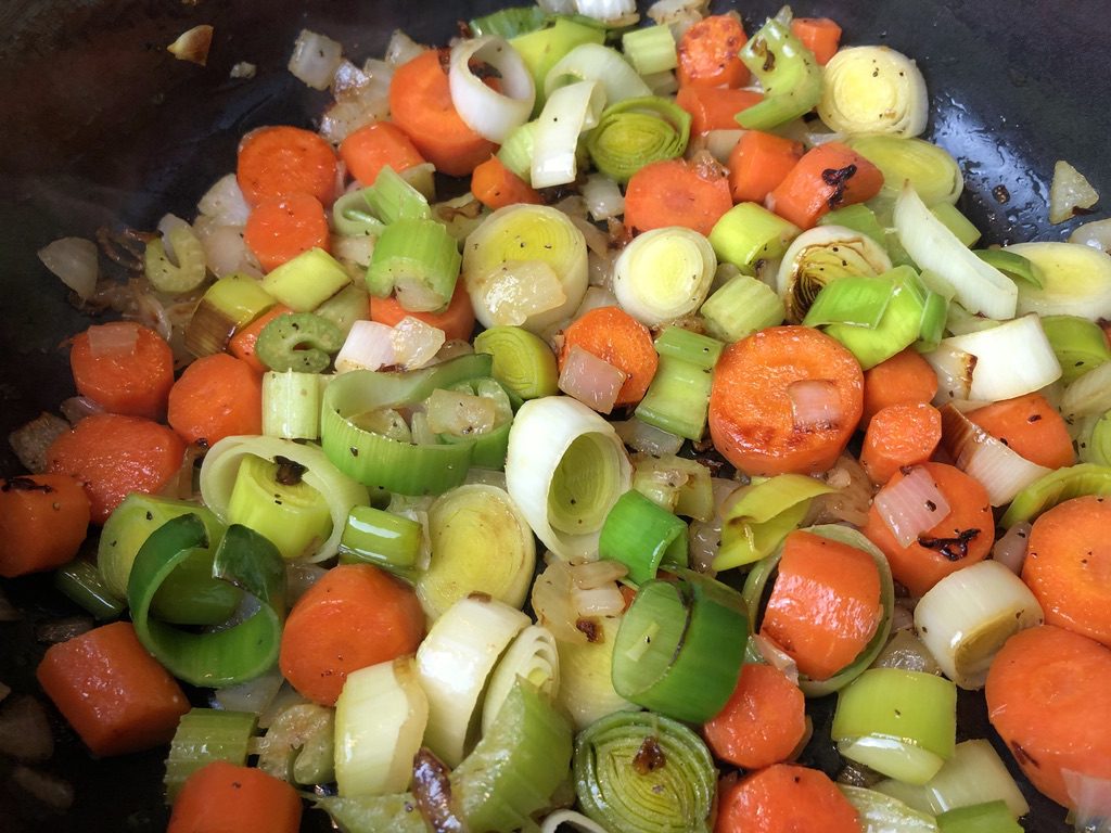 add carrots, onions, and leeks to the shallots & onions and season