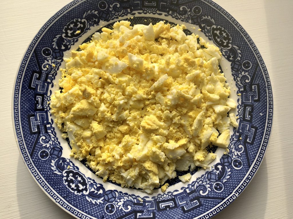 Mash yolks with a fork