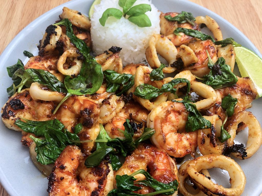 Asian-Glazed Shrimp and Calamari with Wilted Basil
