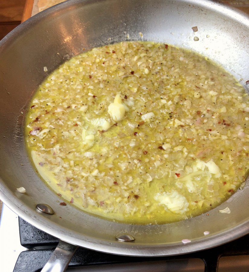 add pat of butter to olive oil