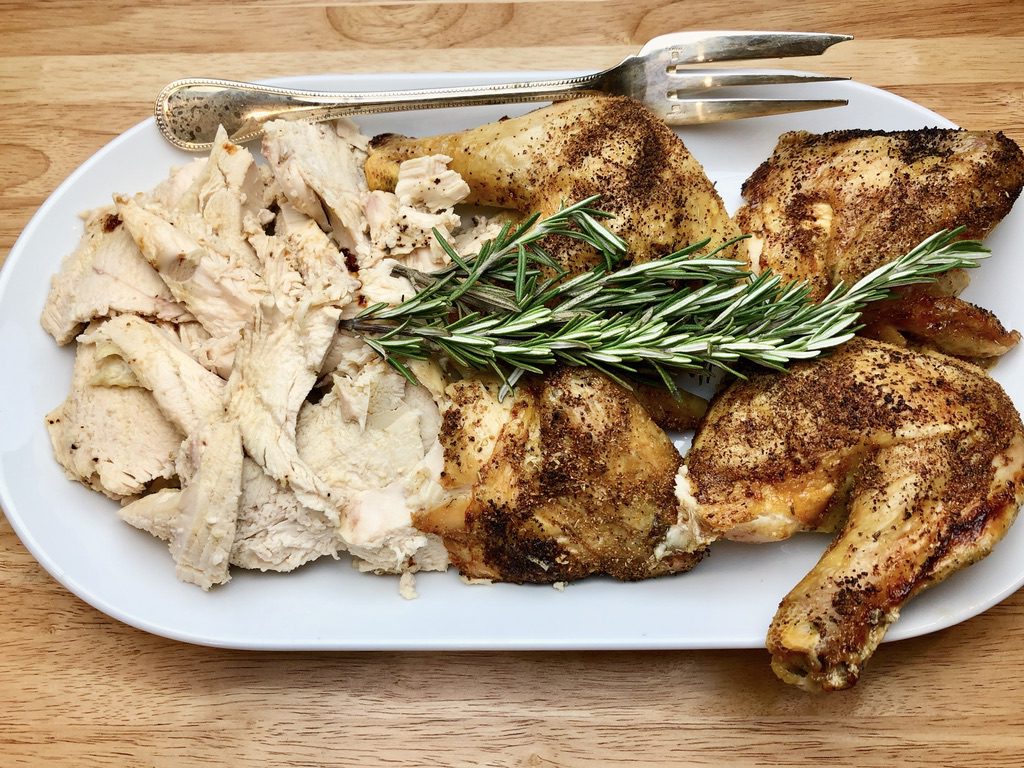 carved roast chicken on a platter