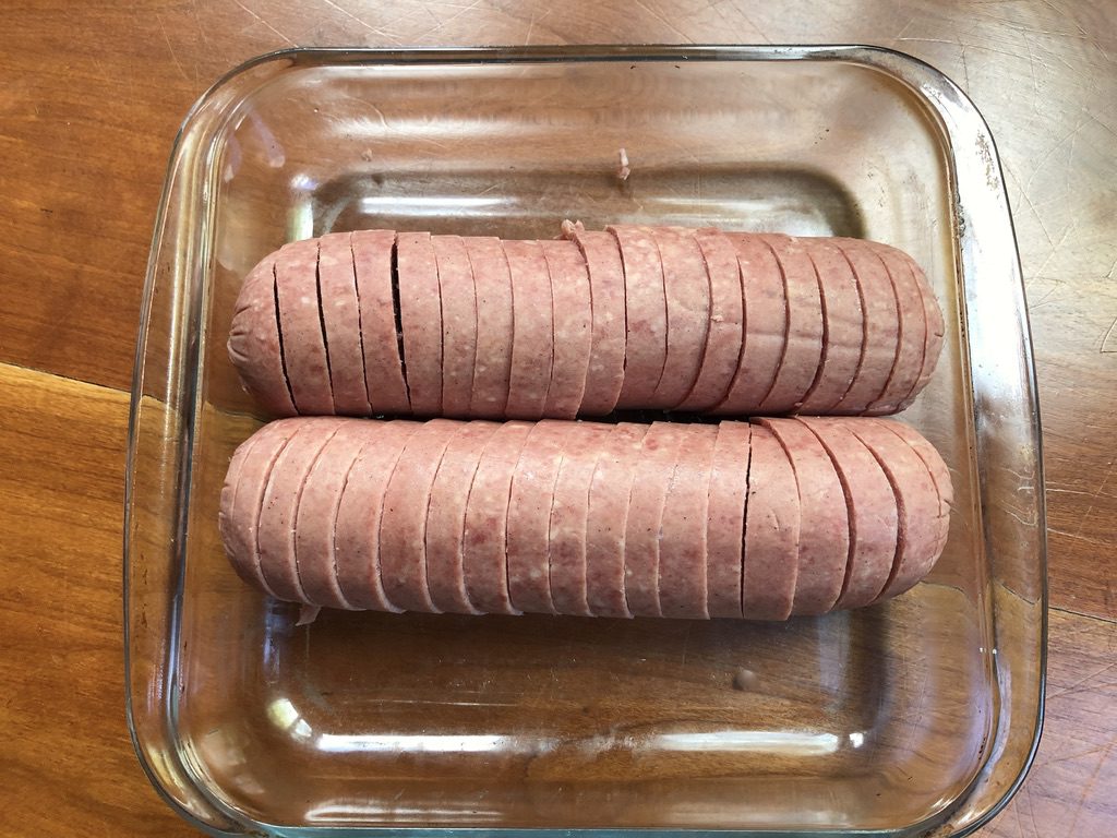 place sliced salami in a square baking dish