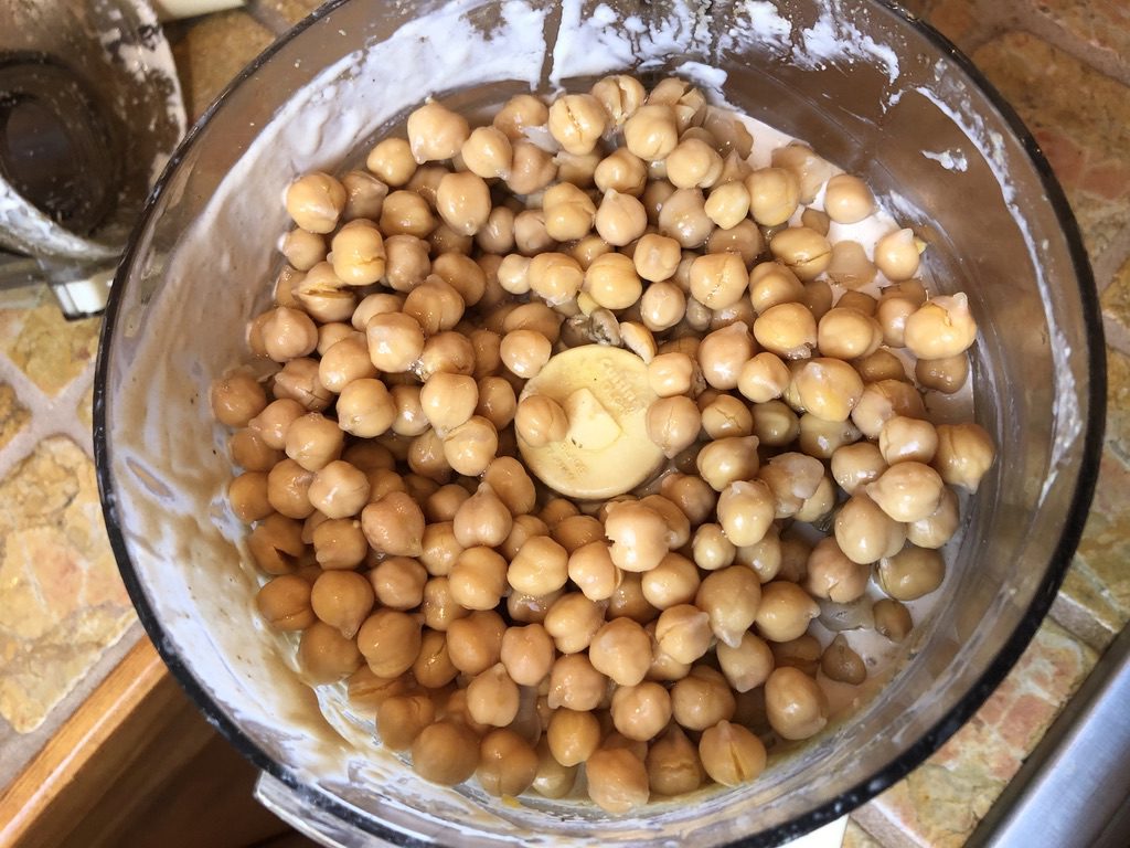 add chickpeas to the tehina in the food processor