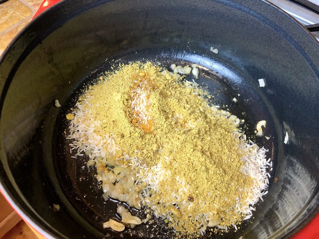 spices added to onion mixture