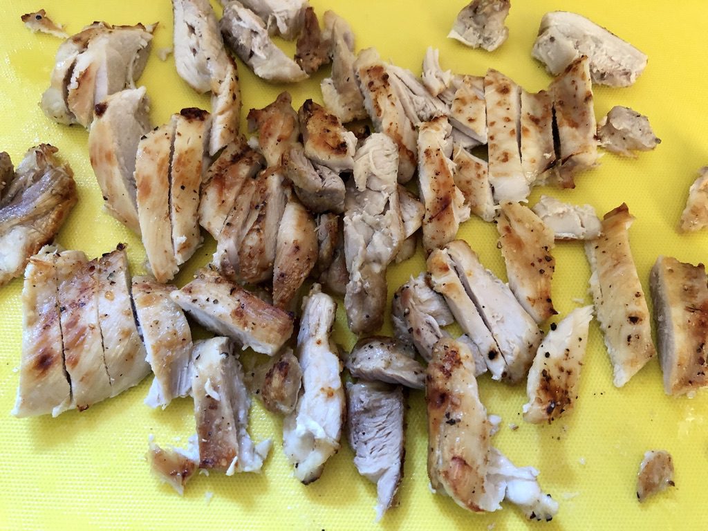 slice chicken thighs once they have cooled