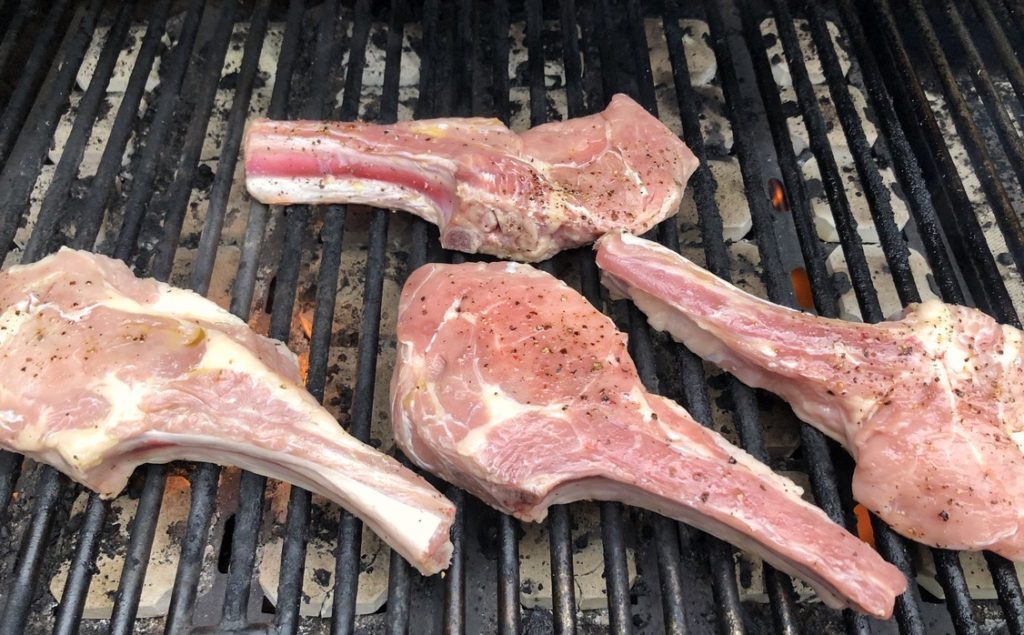 veal chops on preheated grill