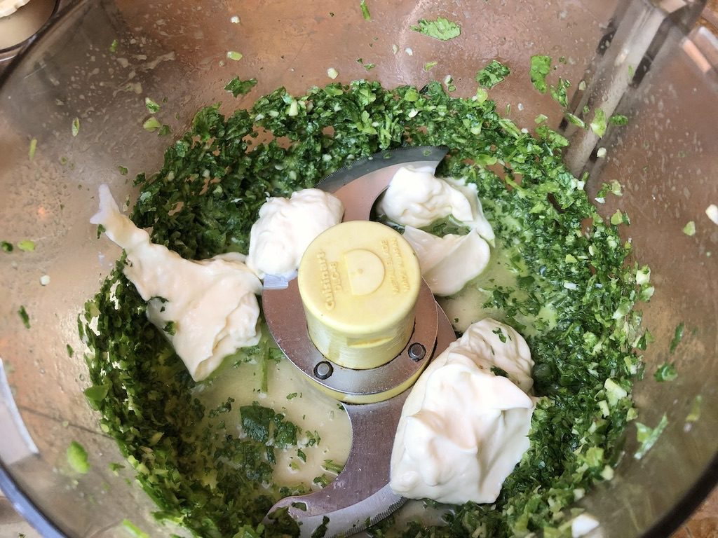 adding mayo to the cilantro base