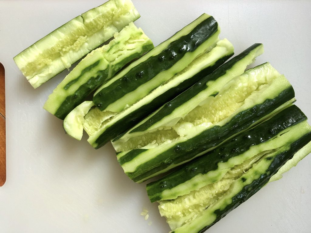 smash cucumbers with a rolling pin or mallet