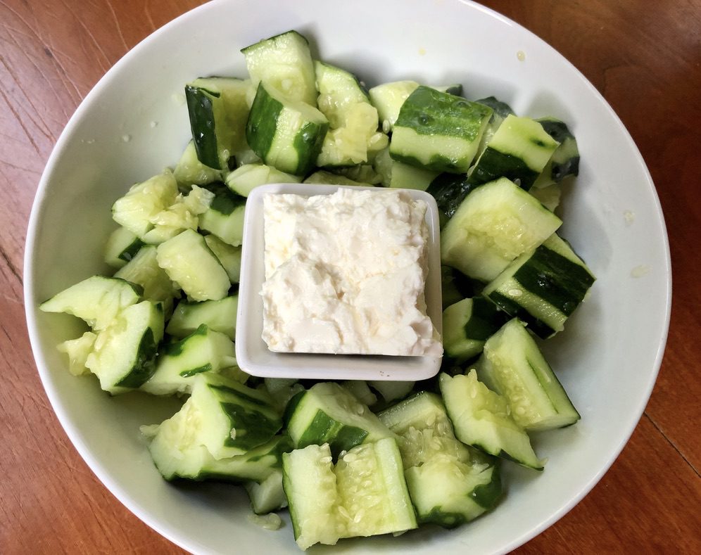 torn smashed cucumbers with feta