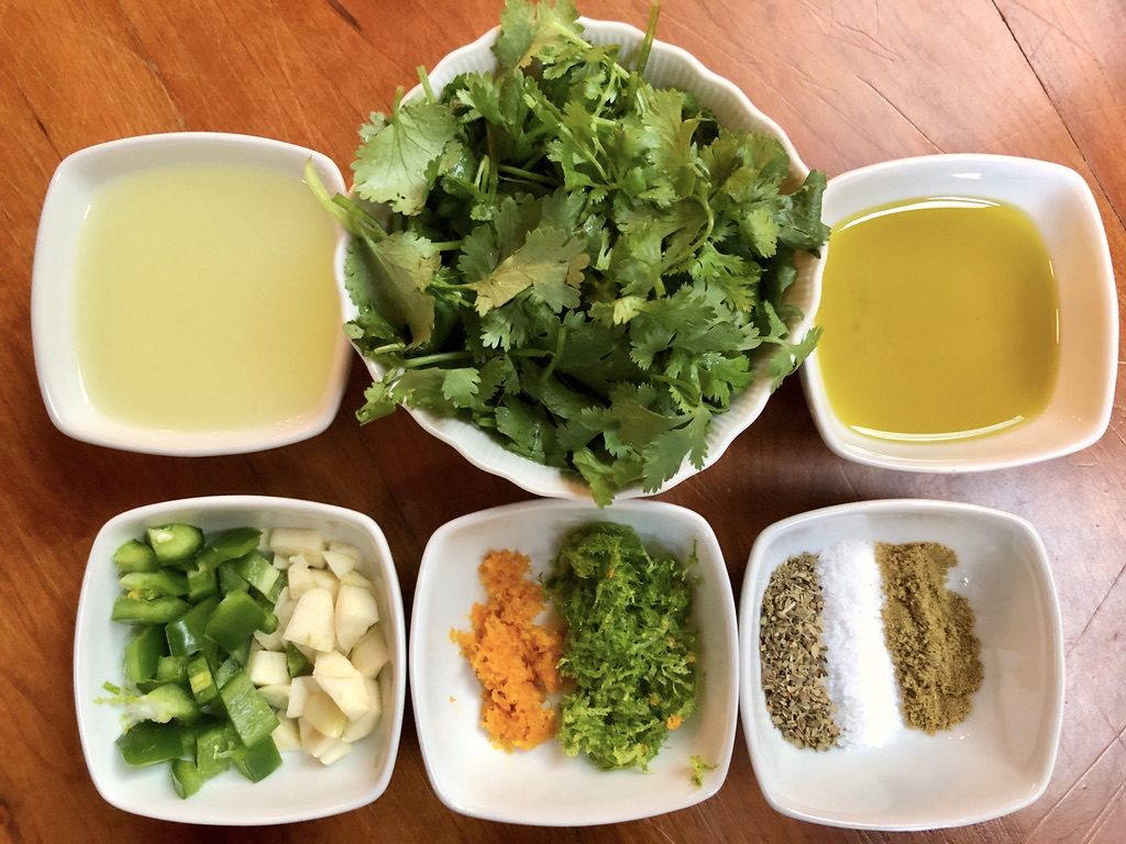 mojo ingredients; cilantro, orange & lime zest, lime juice, olive oil, garlic, jalapeno, cumin, oregano, and salt