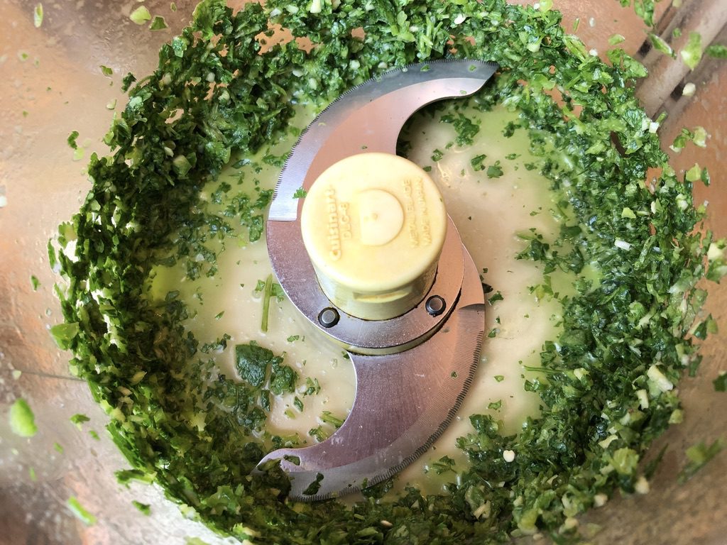 cilantro and seasonings finely minced in the food processor