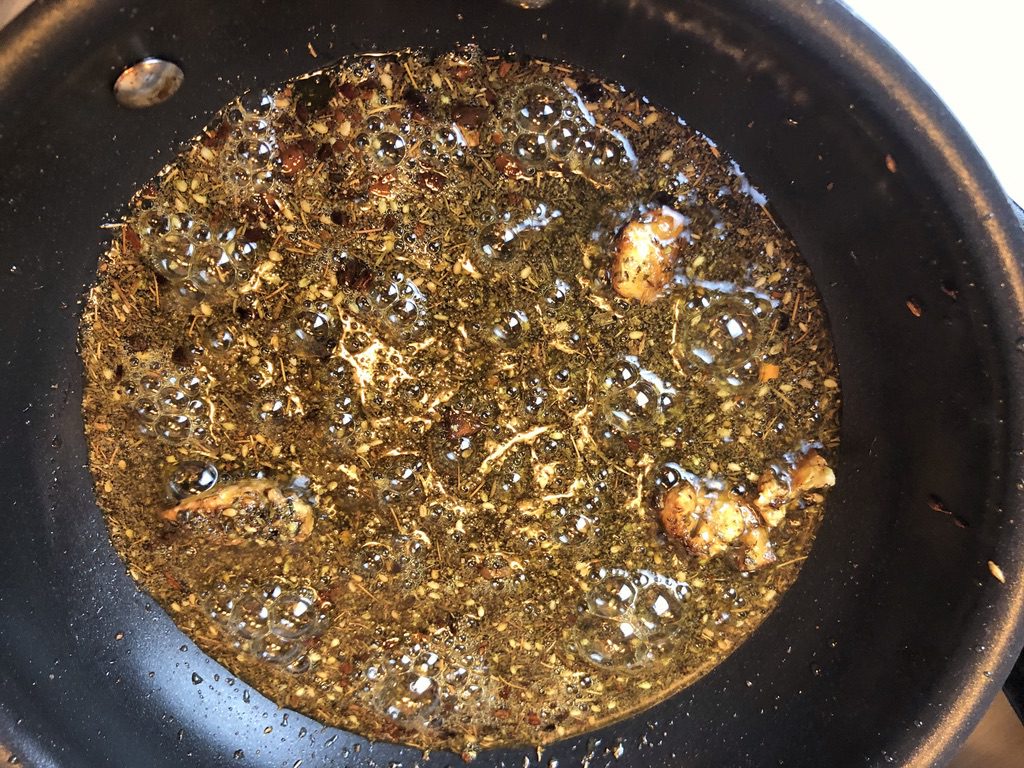 add za'atar and hot pepper flakes.  let cool slightly and mix in lime juice and salt