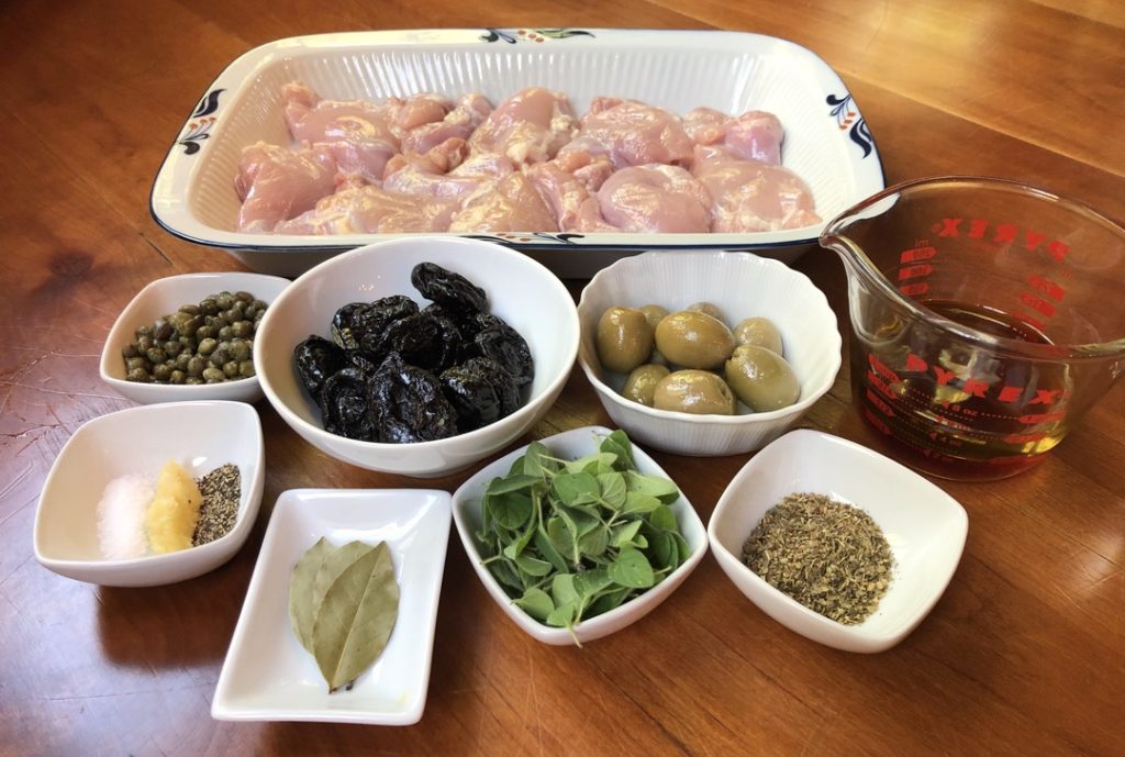 base ingredients: boneless, skinless chicken thighs, olives, pitted prunes, capers, bay leaves, oregano, garlic, olive oil, red wine vinegar, salt and pepper