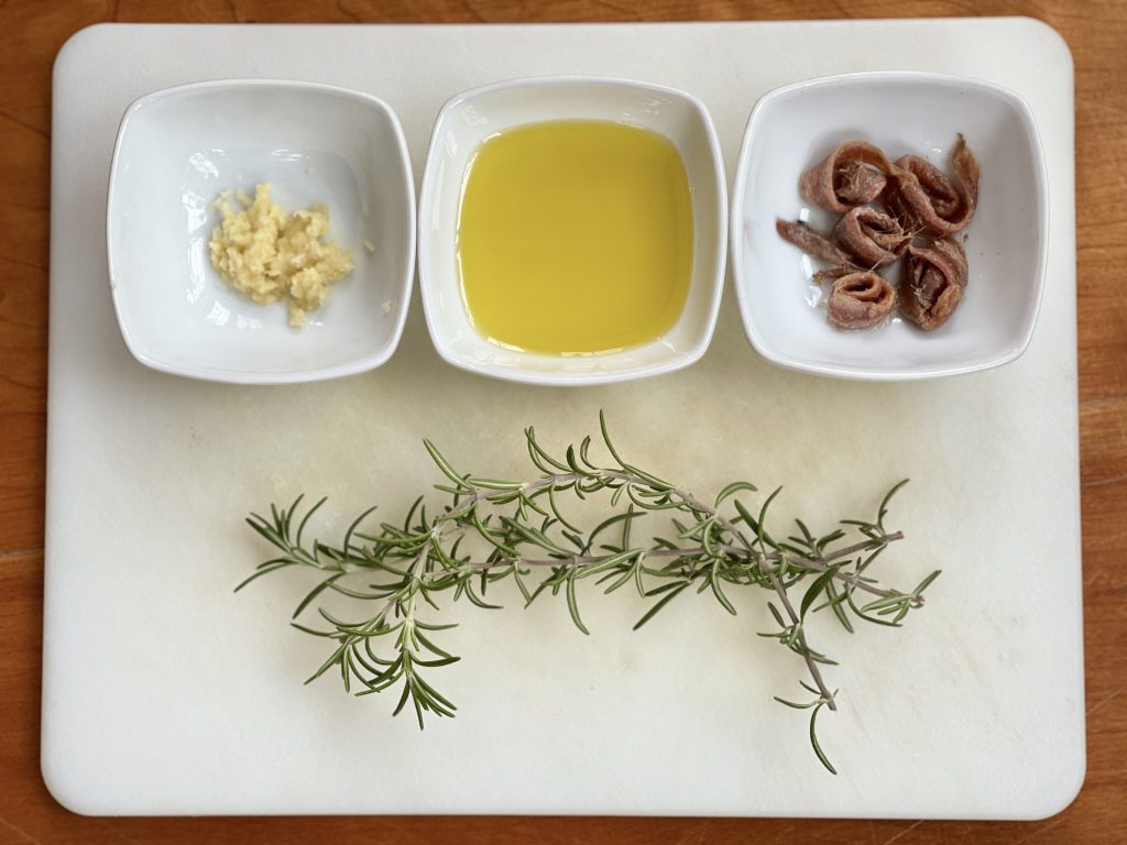ingredients for rub; olive oil, anchovies, garlic, and rosemary