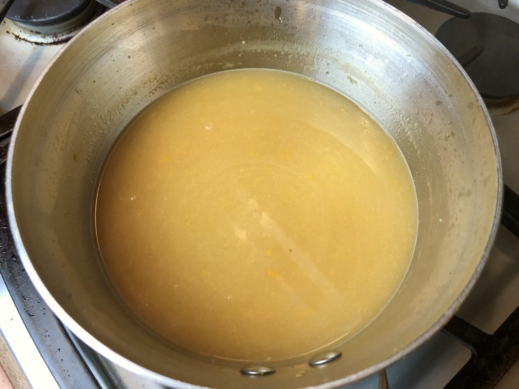 orange sauce with orange juice, orange zest, grand marnier, and salt added, then a pat of butter swirled in