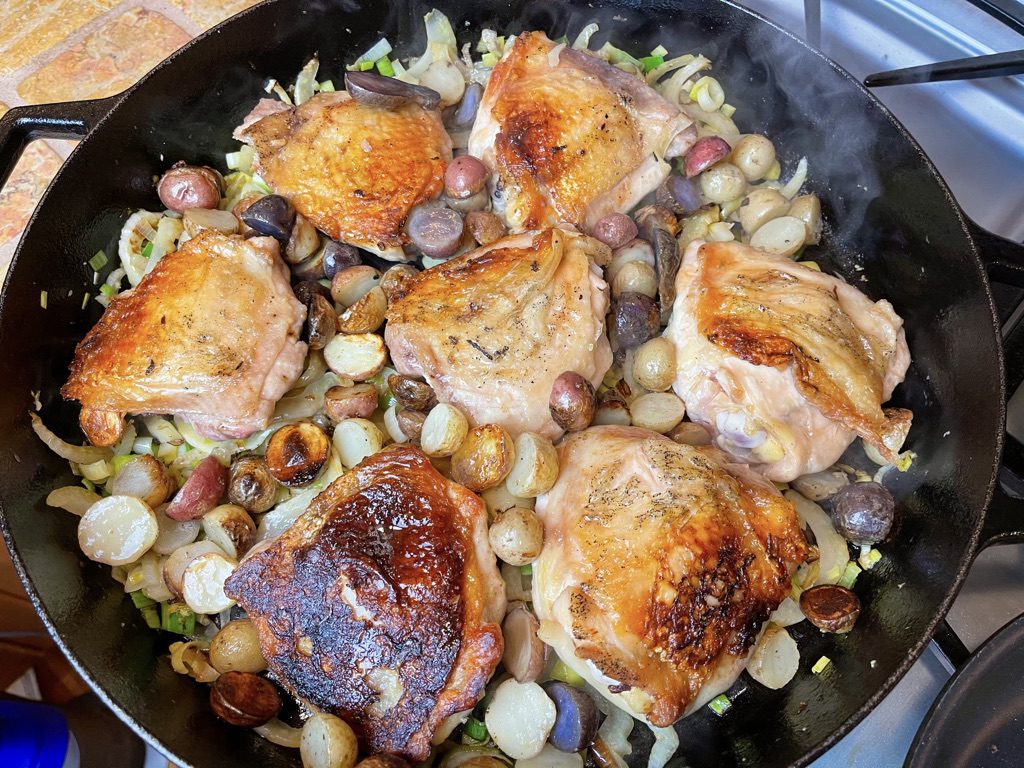 add chicken and potatoes on top of fennel/leek mixture and transfer skillet to the oven