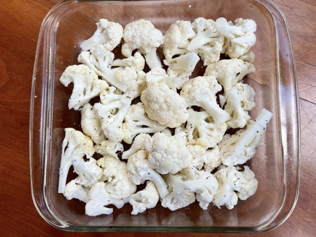 cauliflower florets tossed in olive oil and seasoned w salt and pepper