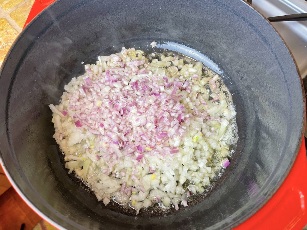 add chopped onion and shallots to oil and butter