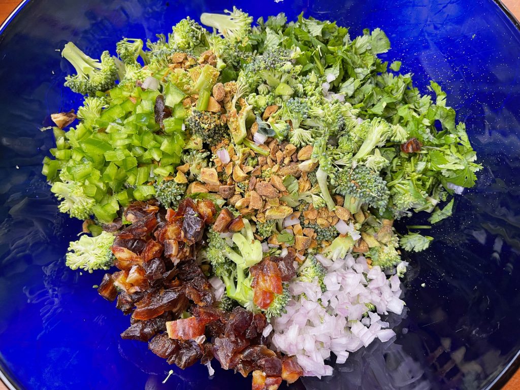 broccoli, dates, pistachios, shallots, jalapeno, and cilantro