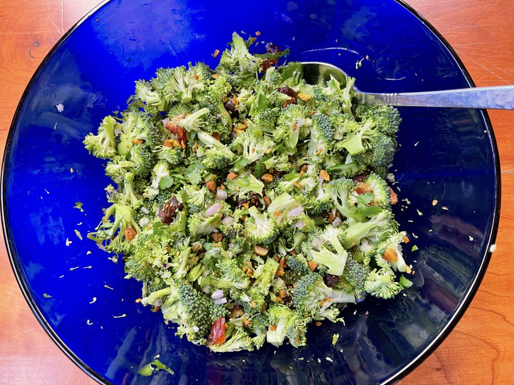thoroughly combine broccoli, dates, pistachios, shallots, jalapeno, and cilantro