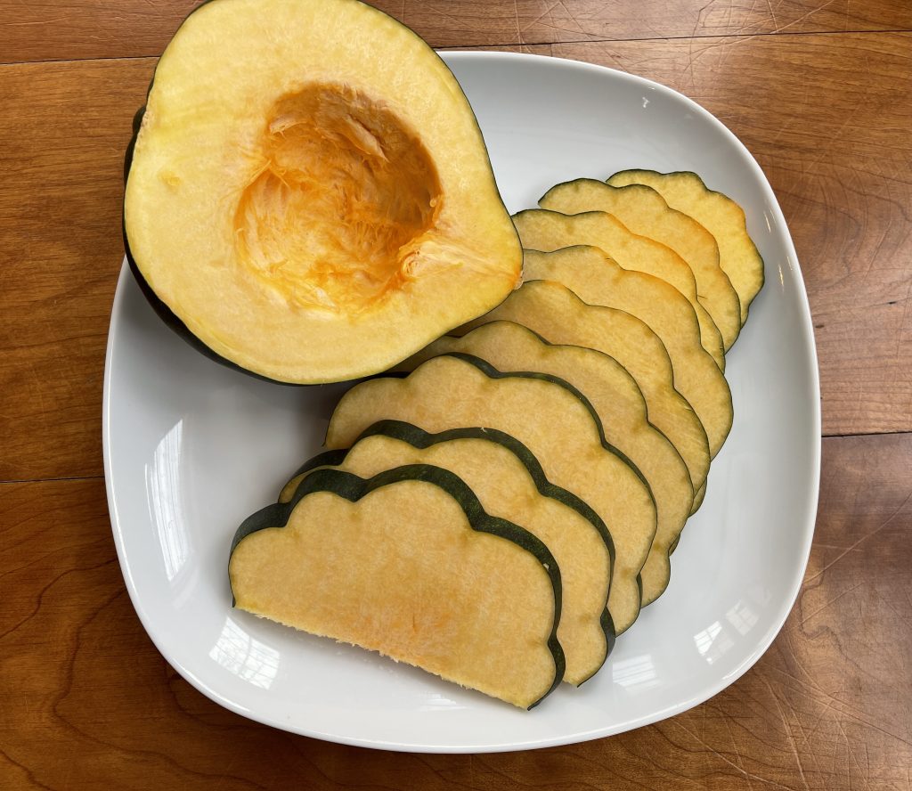 Acorn Squash, cut in half vertically, seeds removed, and sliced crosswise
