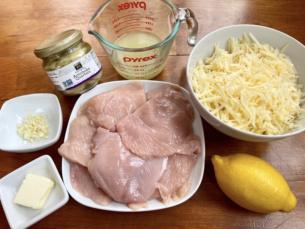 ingredients: boneless chicken breasts, jarred marinated artichokes, chicken broth, lemon, and gruyere cheese