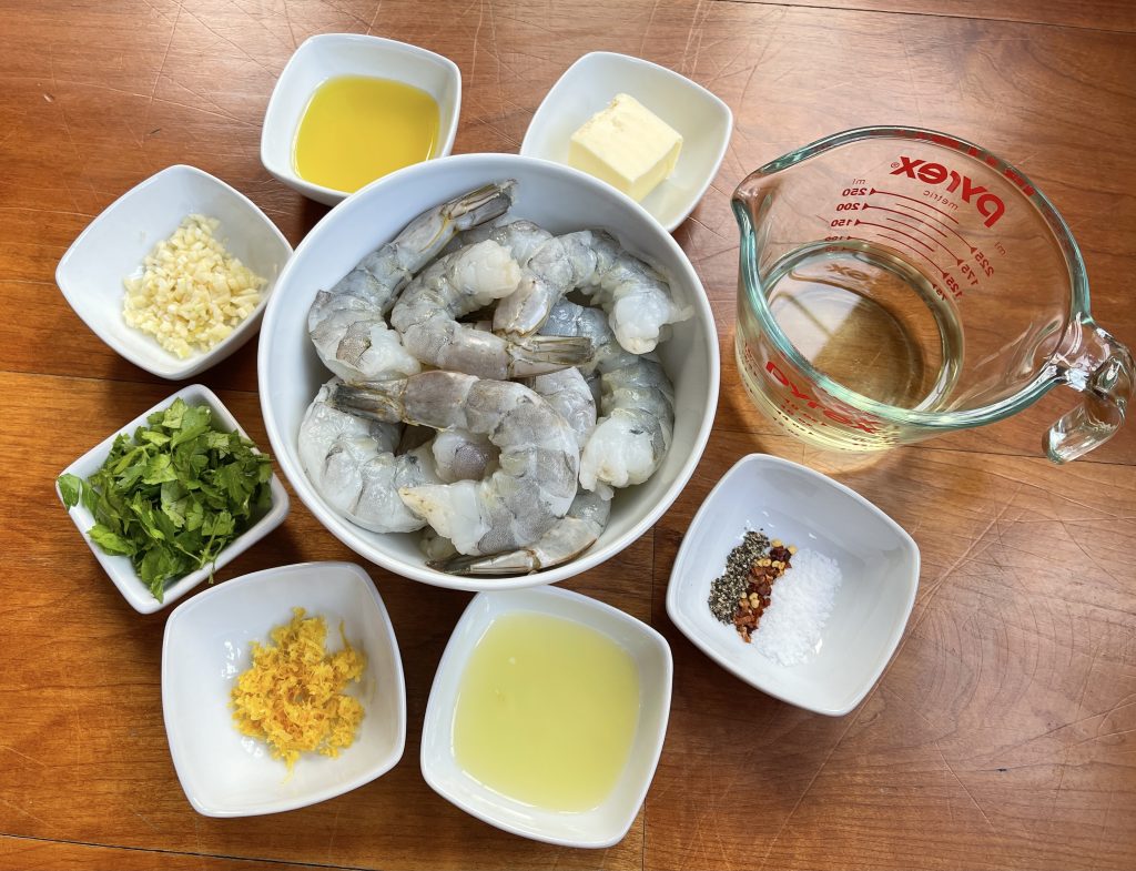 Ingredients for Perfect Shrimp Scampi: Shrimp, Wine, Lemon Zest and Juice, Garlic, Parsley, Butter, Olive Oil, Salt, Pepper, and Red Pepper Flakes