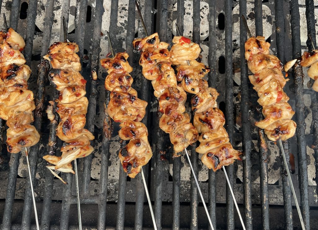 turn skewers, and baste with reserved marinade