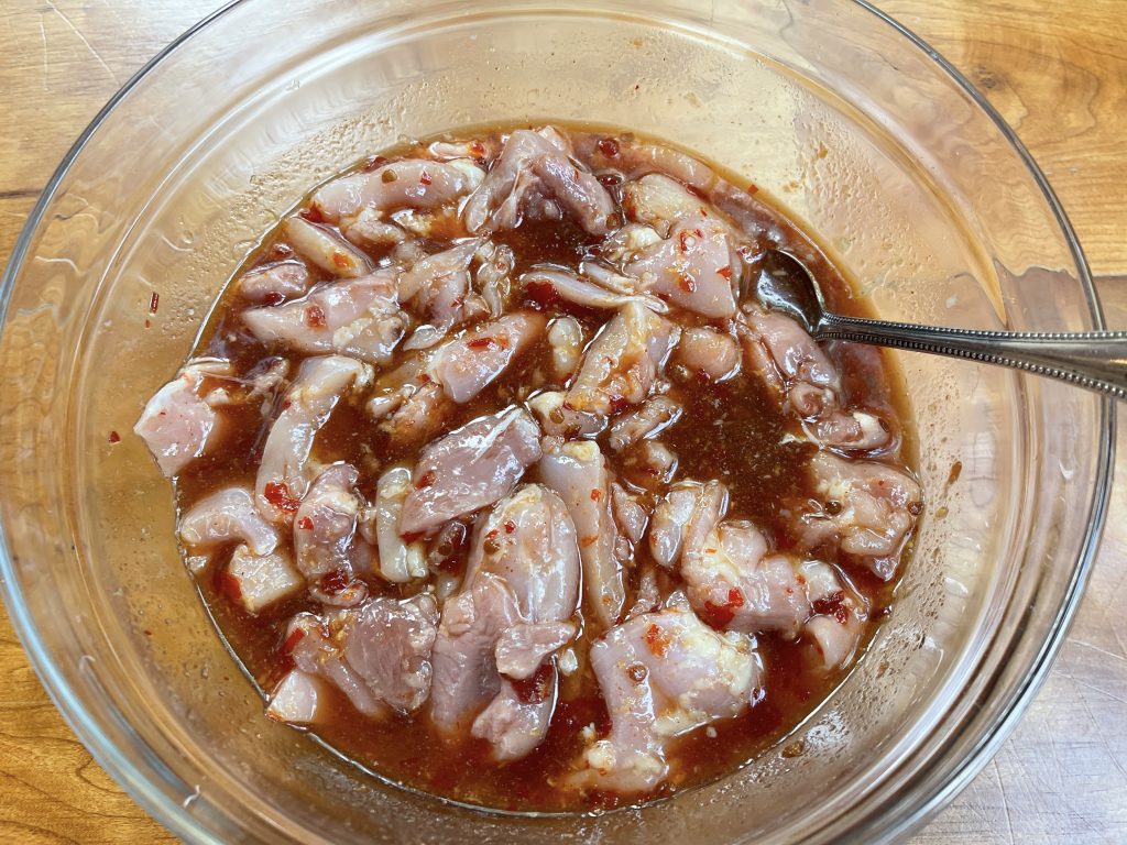 Combine sauce with chicken thigh pieces