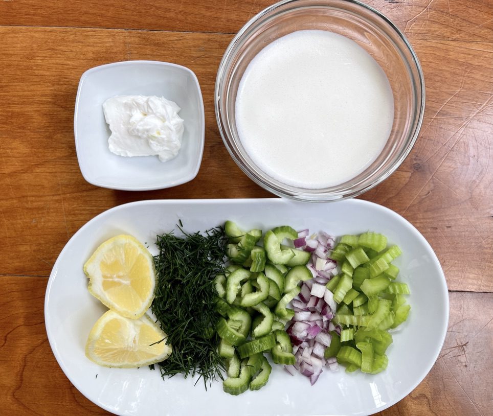 Dill Cream Sauce ingredients:  dill, cucumber, celery, lemon, red onion, sour cream, and heavy cream