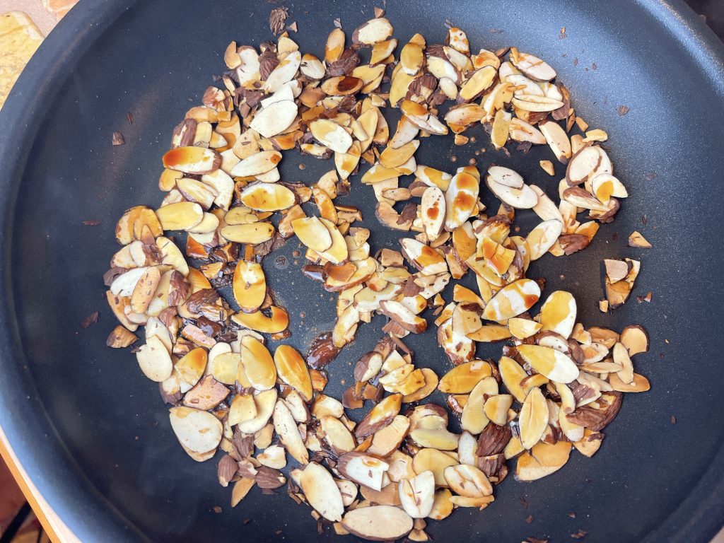 add gluten free soy sauce to the toasted almonds