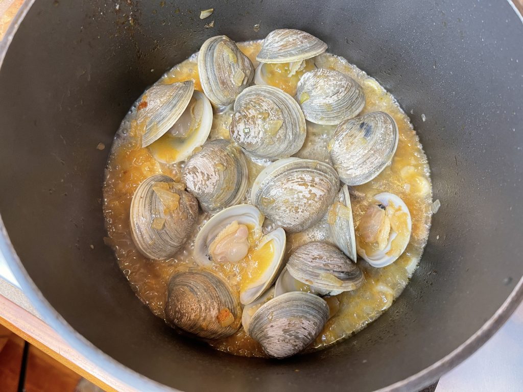 Cook for 5-7 minutes, until clams open up.