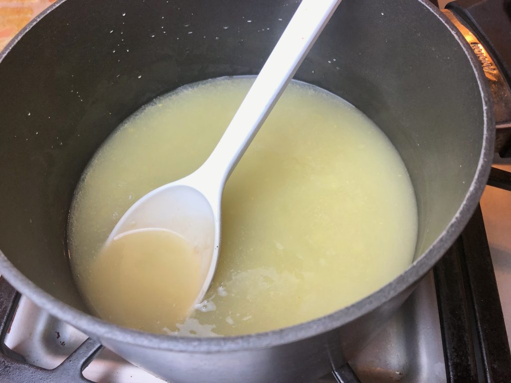Slowly add Slurry to the strained broth.  Mix until thickened, approx 5 mins