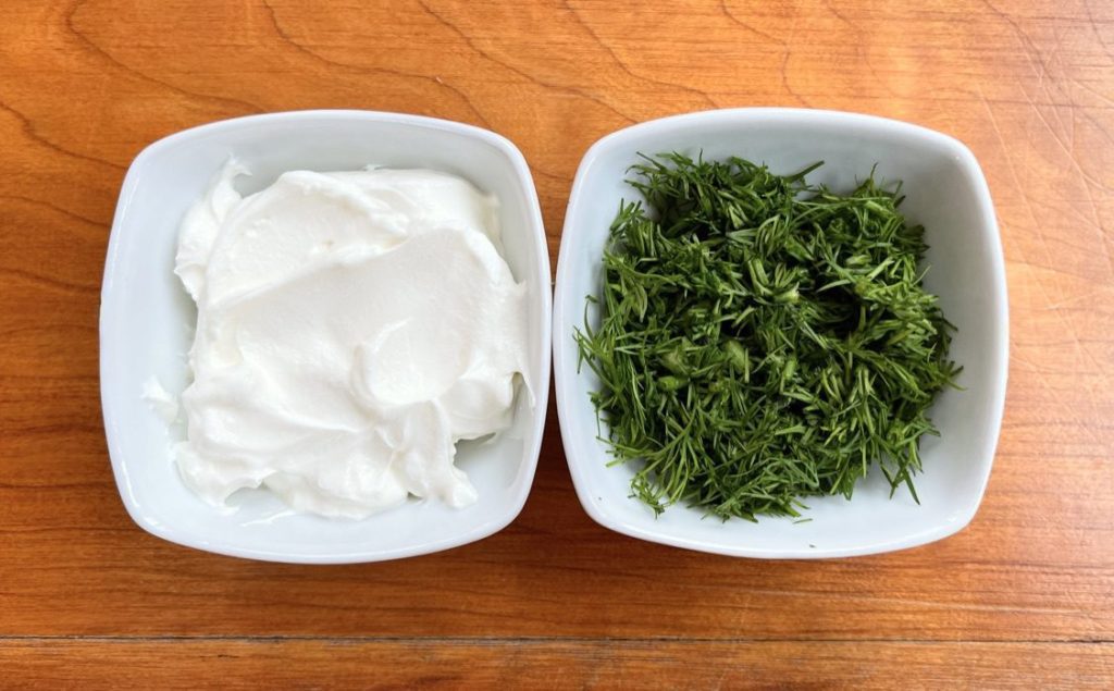 while cabbage is cooking in the oven, organize and prep the dill and sour (or greek yogurt)