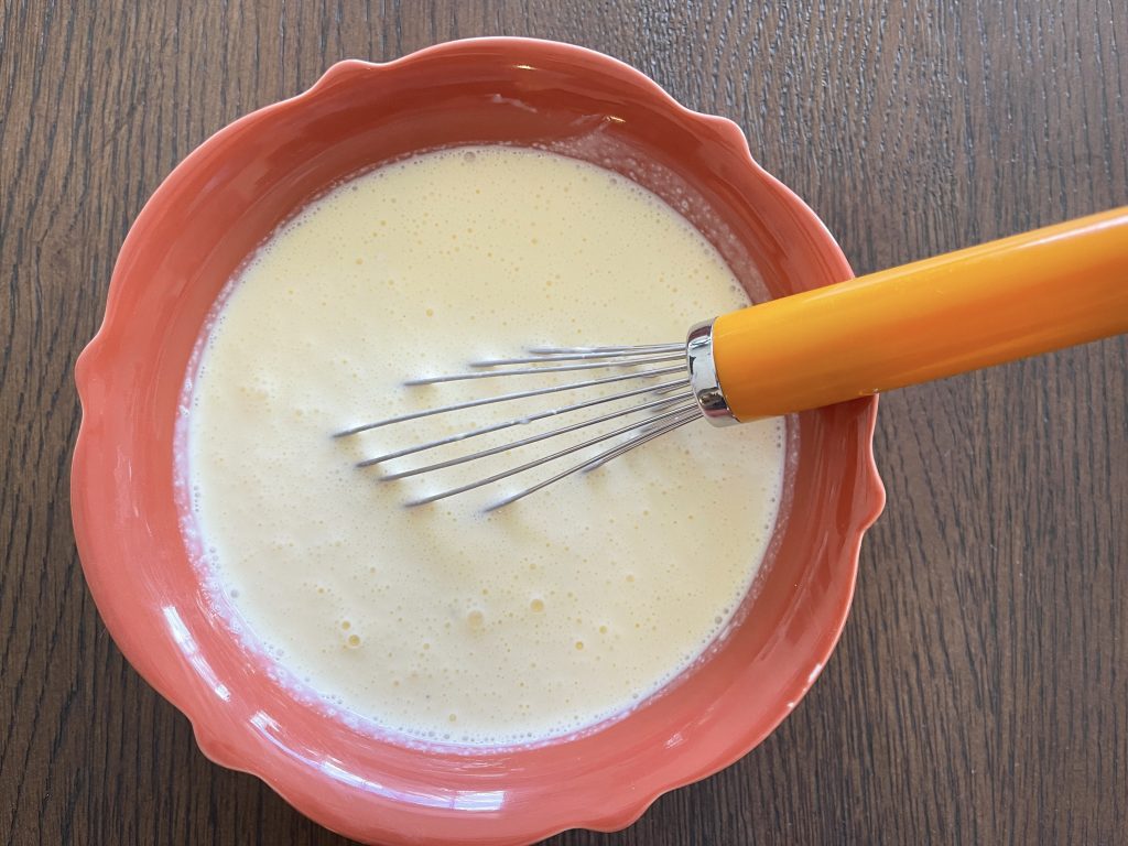 make the custard - eggs, heavy whipping cream and creme fraiche