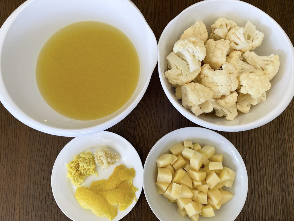 ingredients for soup base:  chicken or vegetable stock or broth, lemongrass or lemon peel, cauliflower, potato, ginger, and garlic.