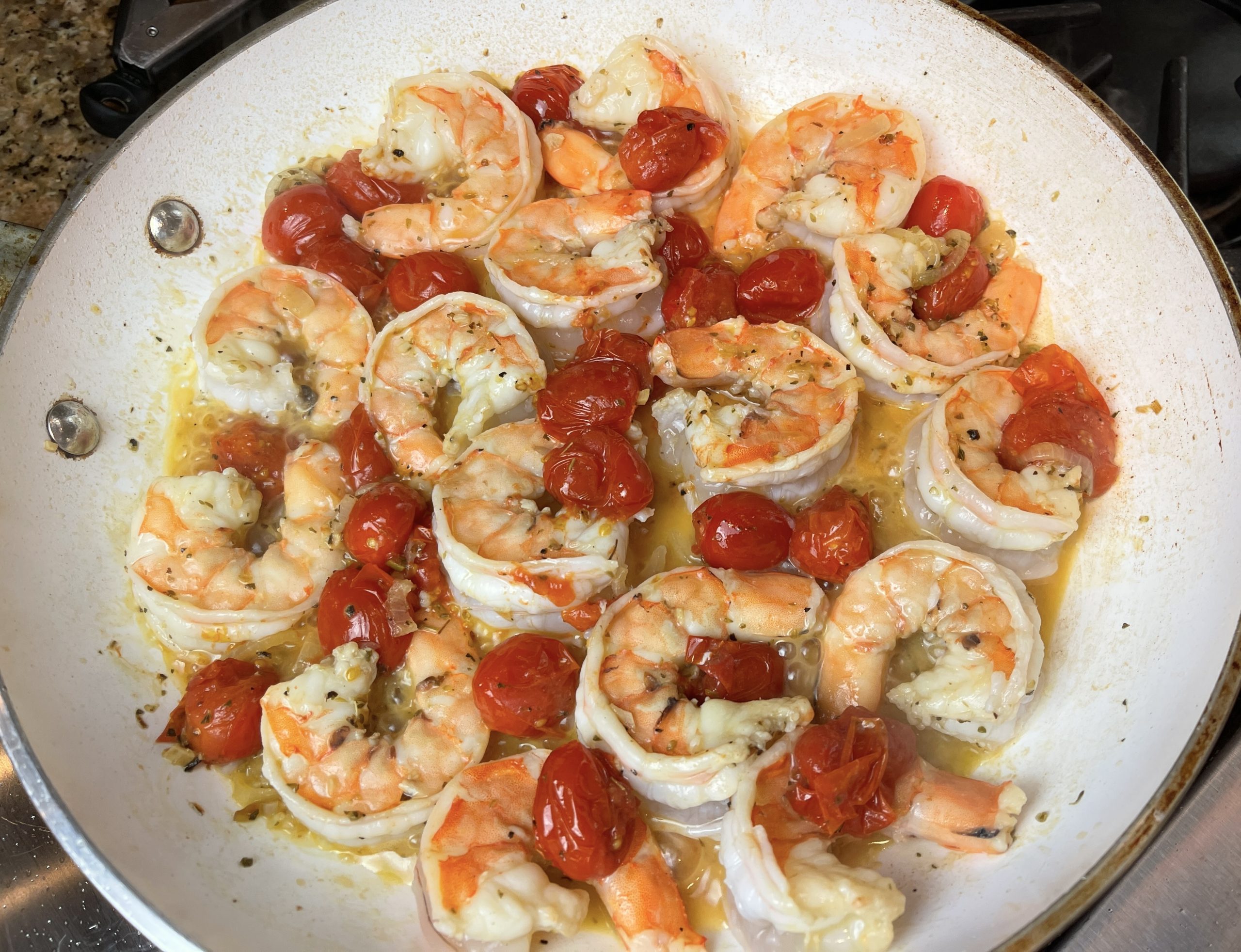 add the shrimp and cook until the shrimp turn pinkis-orange from grey, approx 1 1/2 mins per side
