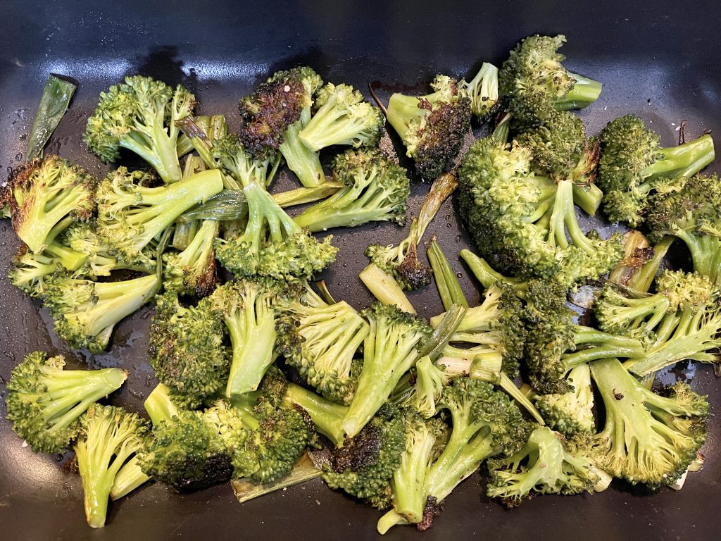 cook broccoli until crisp and browned in spots, 15-20 mins