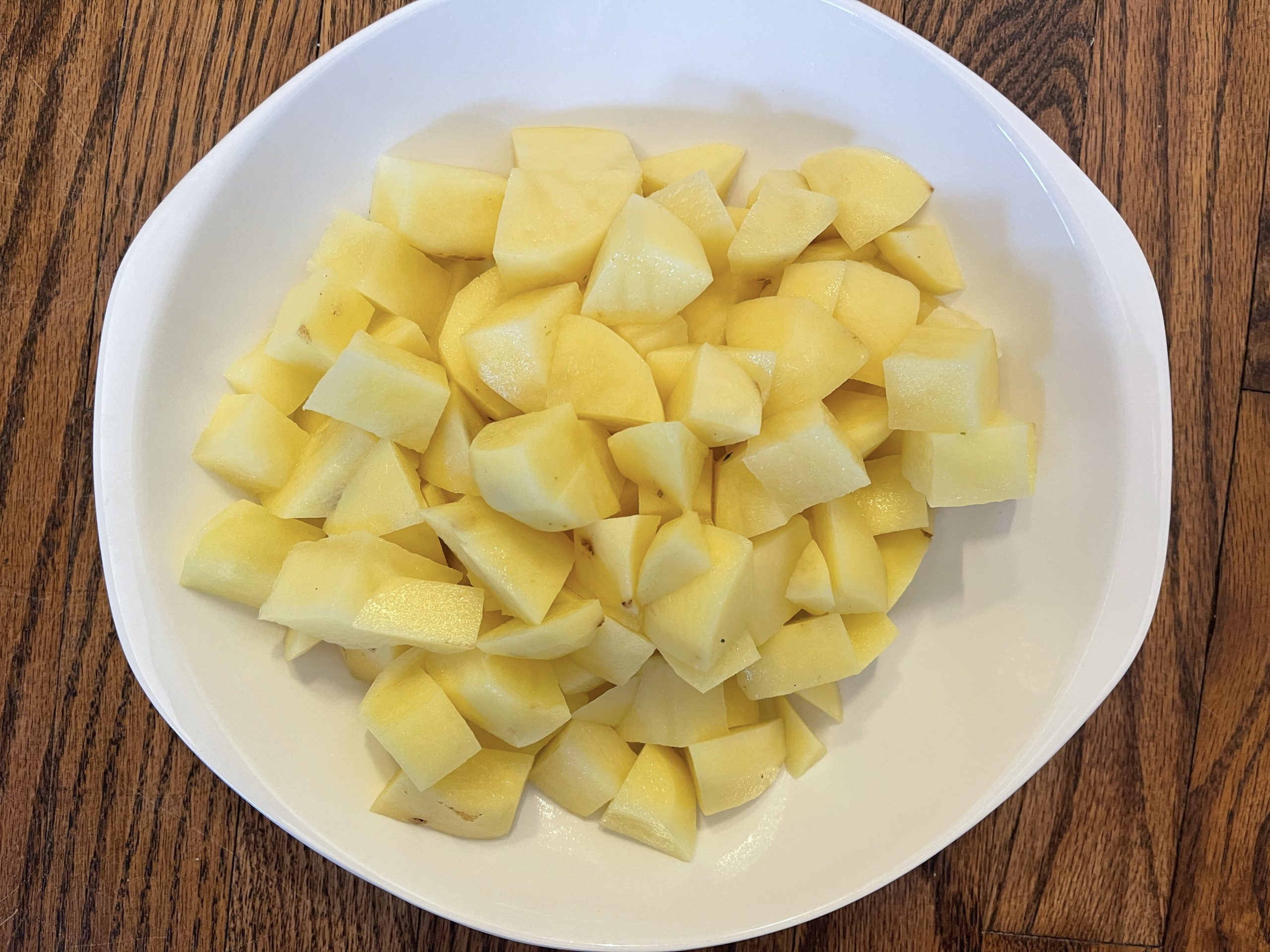 peel and dice potatoes into 1 1/2-2" pieces